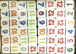Mexican Train set with numbered dominoes