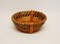 This attractive basket is a large rustic style round basket. The large rustic basket measures 13" dia x 4" deep. The rustic basket has slotted handles for easy handling! 