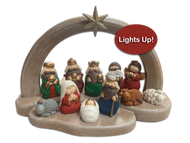 11 piece nativity set for children. Star at the top lights up. Needs 2 AAA batteries (not included). Made of a resin-stone mix.  