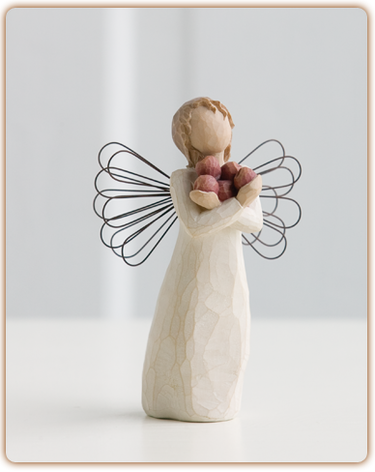 Bring an abundance of health and happiness into your home with this 5 inch tall angel of good health angel figurine holding apples