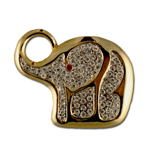 This beautiful elephant pin/brooch is complimented with white diamond like Swarovski crystals and one red crystal for the eye. Gold-plate only.
