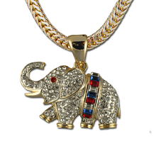 Beautiful Crystal Elephant with Baguette Cut Red, White and Blue Crystals. Truly a unique piece. 1.5"