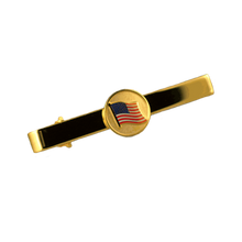 Goldplated tie bar with American flag logo