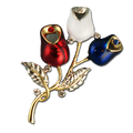 Two tone red, white and blue enamel rosebud brooch/pin. Includes an elegant touch of crystal. Approx. 2".