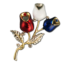 Two tone red, white and blue enamel rosebud brooch/pin. Includes an elegant touch of crystal. Approx. 2".