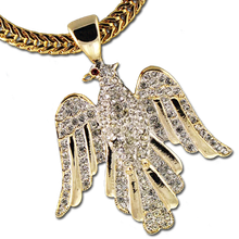 This beautiful Eagle Neckslide is adorned with diamond like Swarovski crystals and makes a great statement!  (Size: Approx. 2.5"h x 1.75"w, goldplate). Chain not included.