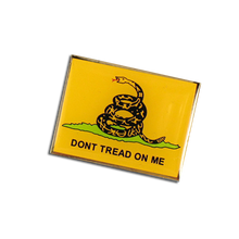 "Don't Tread on Me". The Gadsden flag is a historical American flag with a yellow field depicting a rattlesnake coiled and ready to strike.