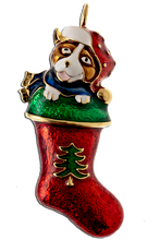 All the colors of Christmas are in this brooch win enamel with goldplate trim and the added feature of an adorable puppy. Size: 1" x 2", pin backing, lead free.