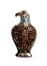 Beautiful Bald Eagle Pin. Goldplate with smoked topaz crystals set with dark brown enamel, diamond like crystals and a red crystal eye. 1.75", pin back.
