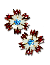 Patriotic Carnation earrings in red and white enamel with blue Swarovski crystals in the center of the flower. Goldplate, post back, 0.75"H x 0.75"W. 