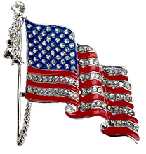 Waving American flag brooch/pin with red enamel stripes and diamond-like crystals for the white bands.