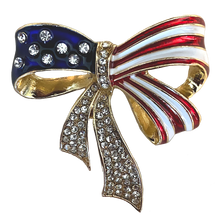 Beautiful patriotic bow pin which has a hidden bale and can be worn as a neckslide.