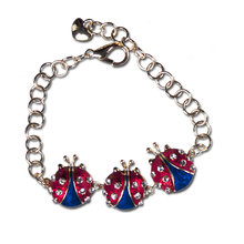 Red and Blue Enamel and Diamond-like Swarovski Crystals.