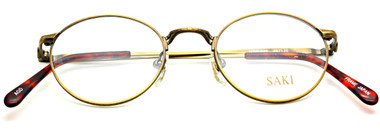 Saki 570 AGD Antique Gold Oval Eyewear from www.eyehuggers.co.uk