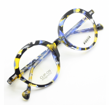 Les Pieces Uniques almost round glasses in tortoiseshell with blue at Eyehuggers